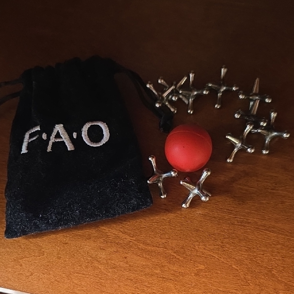 FAO Silver and Red Jacks Game Set